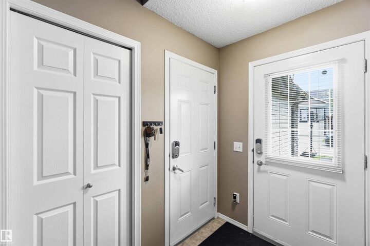 Property Photo:  6520 2 Avenue SW 24  AB T6X 1S4 