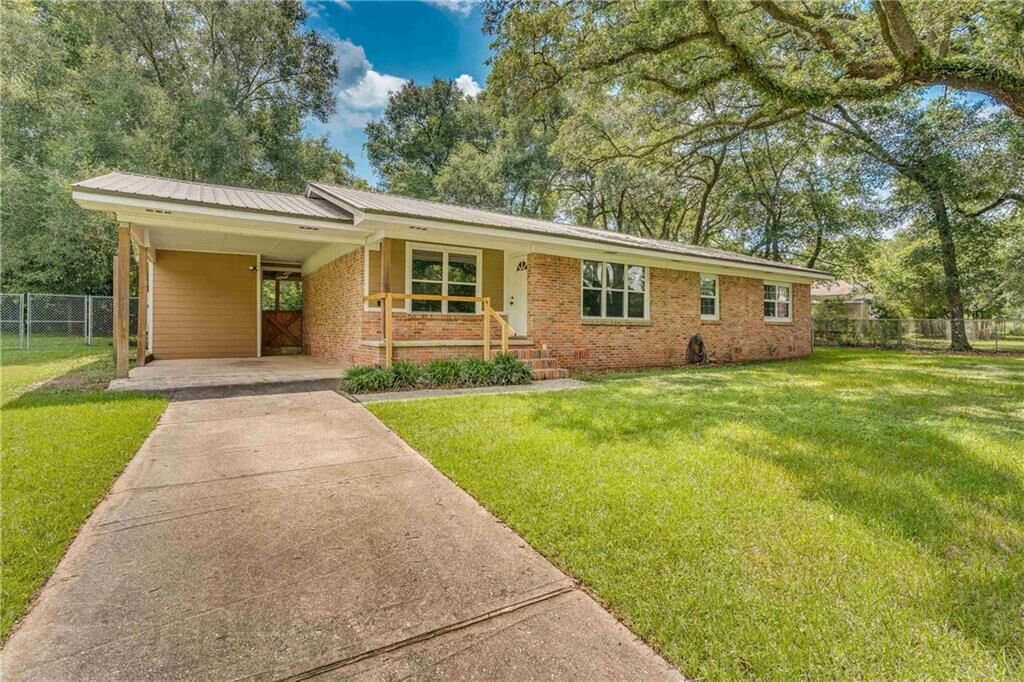 Property Photo: 4451 Gerbera Drive AL 36619