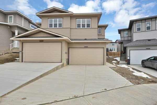 Property Photo: 86 Heritage Circle AB T4C 3G9