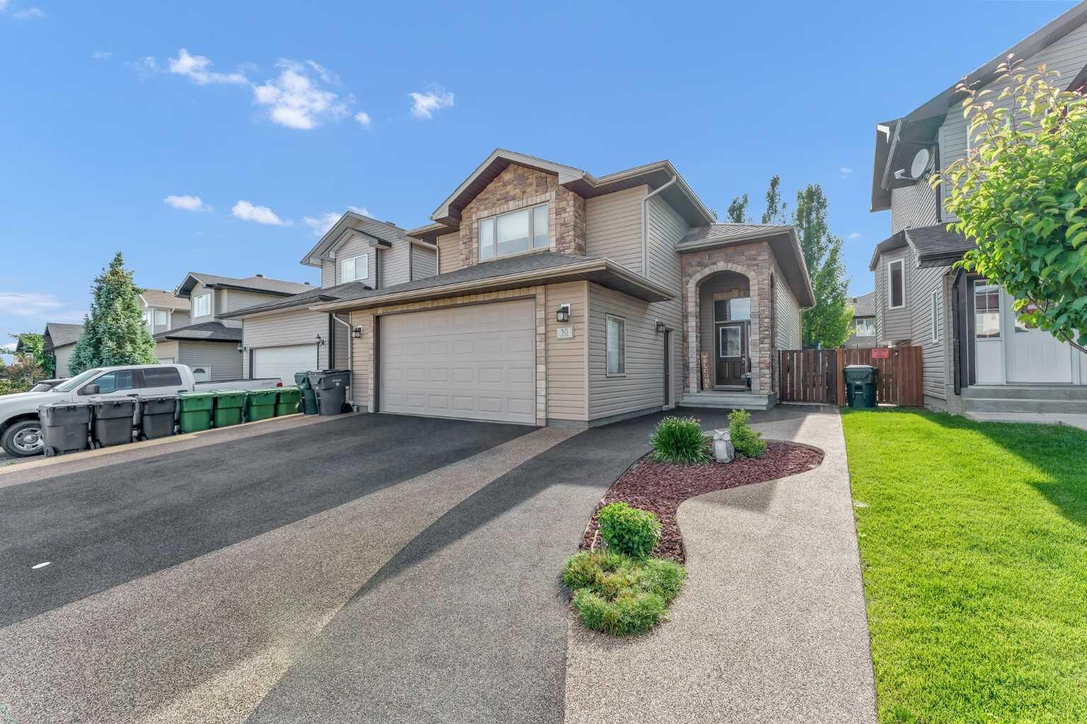 Property Photo: 30 Vista Close SE AB T1B 0A9
