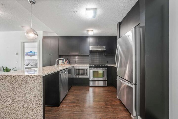 Property Photo: 25 Aspenmont Heights SW 111 AB T3H 0E4