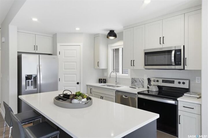 Property Photo: 1218 Yuel Way SK S7W 1P2