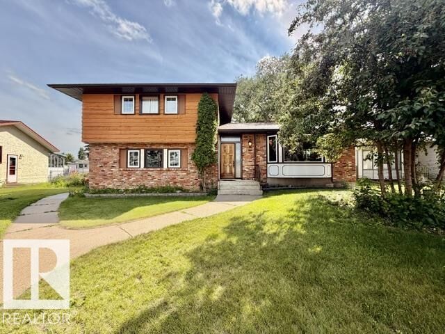 Property Photo: 111 Green Ash Drive AB T9A 2H7