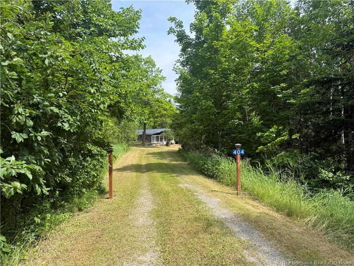 Property Photo: 404 Sisson Ridge Road NB E7G 3X7