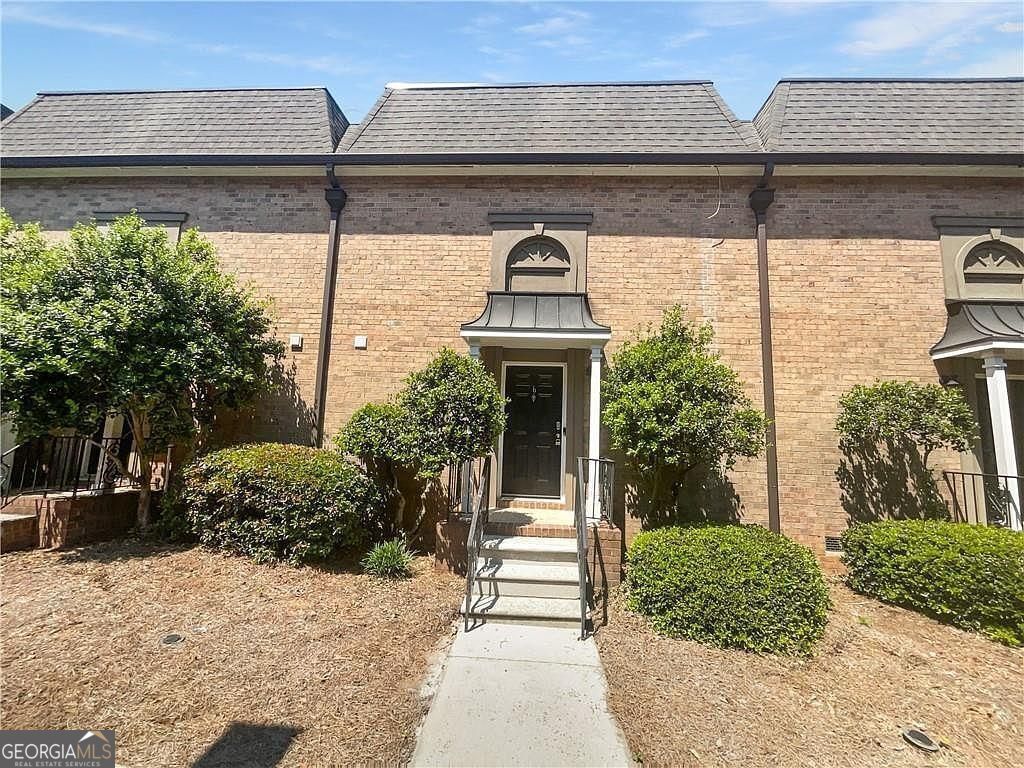 Property Photo:  6980 Roswell Road Road K5  GA 30328 