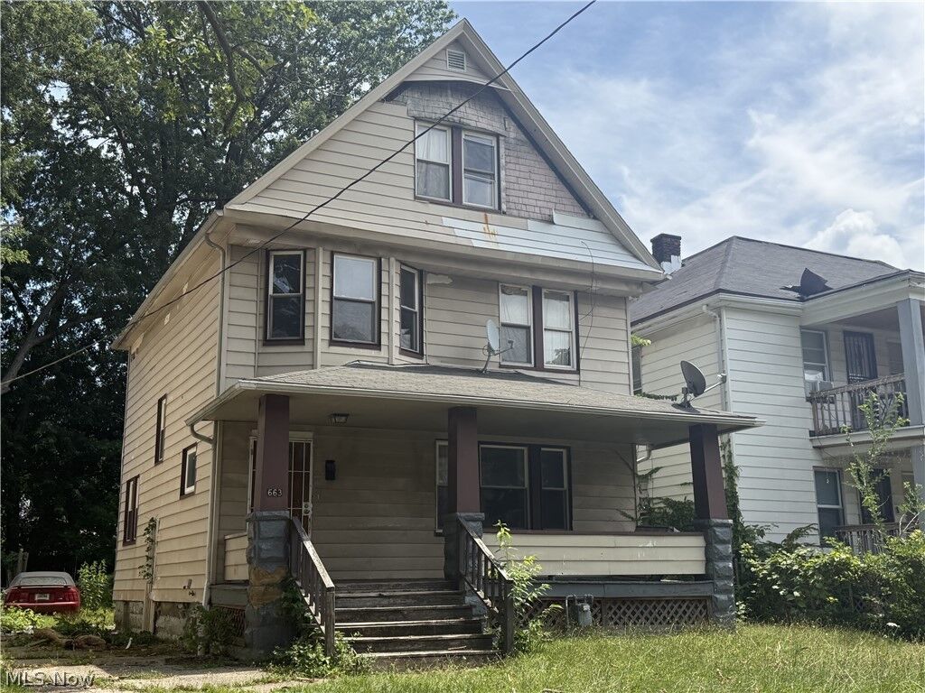 Property Photo:  663 E 115th Street  OH 44108 