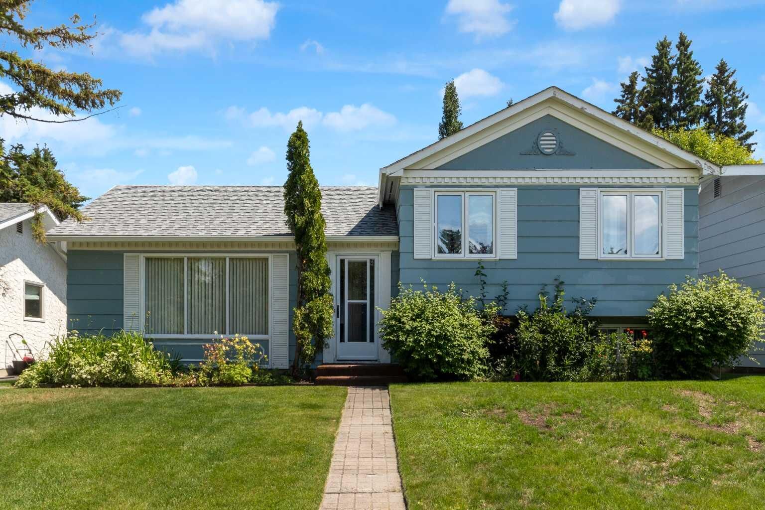Property Photo:  11224 Wilson Road SE  AB T2J 2E2 