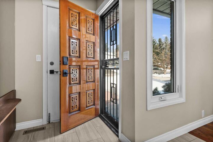 Property Photo: 7715 67 Avenue NW AB T3B 4P2
