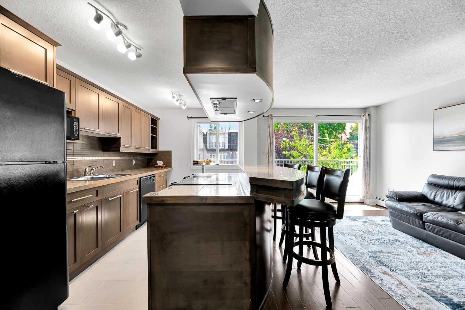 Property Photo: 1730 7 Street 302 AB T2T 2W6