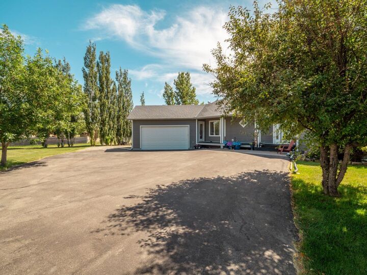 Property Photo:  219 Falcon Ridge Way W  AB T1J 5R8 