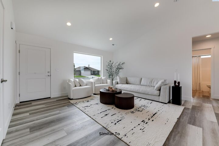 Property Photo:  10123 Redbud Dr  WA 99301 