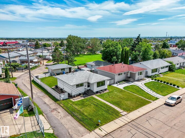 Property Photo: 13323 58 Street NW AB T5A 0P9