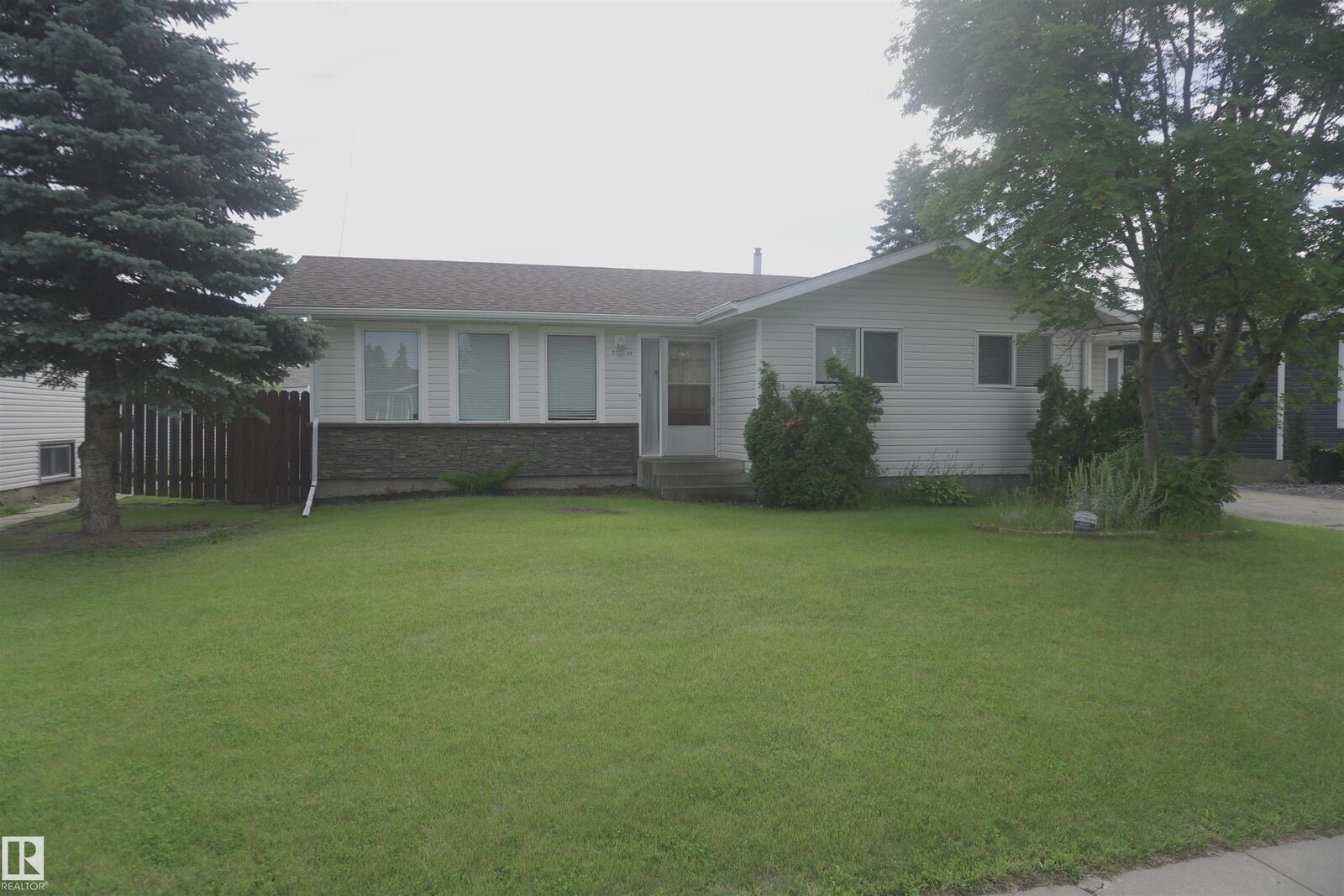 Property Photo: 5713 49 Street AB T9C 1G6
