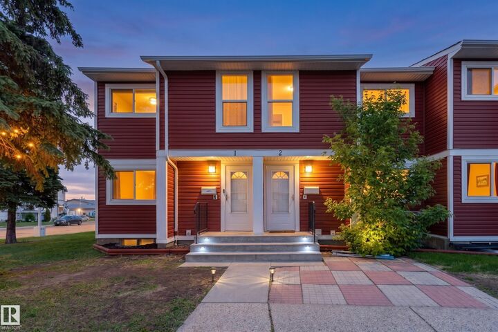 Property Photo:  4707 126 Avenue NW 2  AB T5A 4K4 