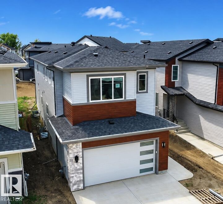 Property Photo: 8916 Mayday Way SW AB T6X 3E9