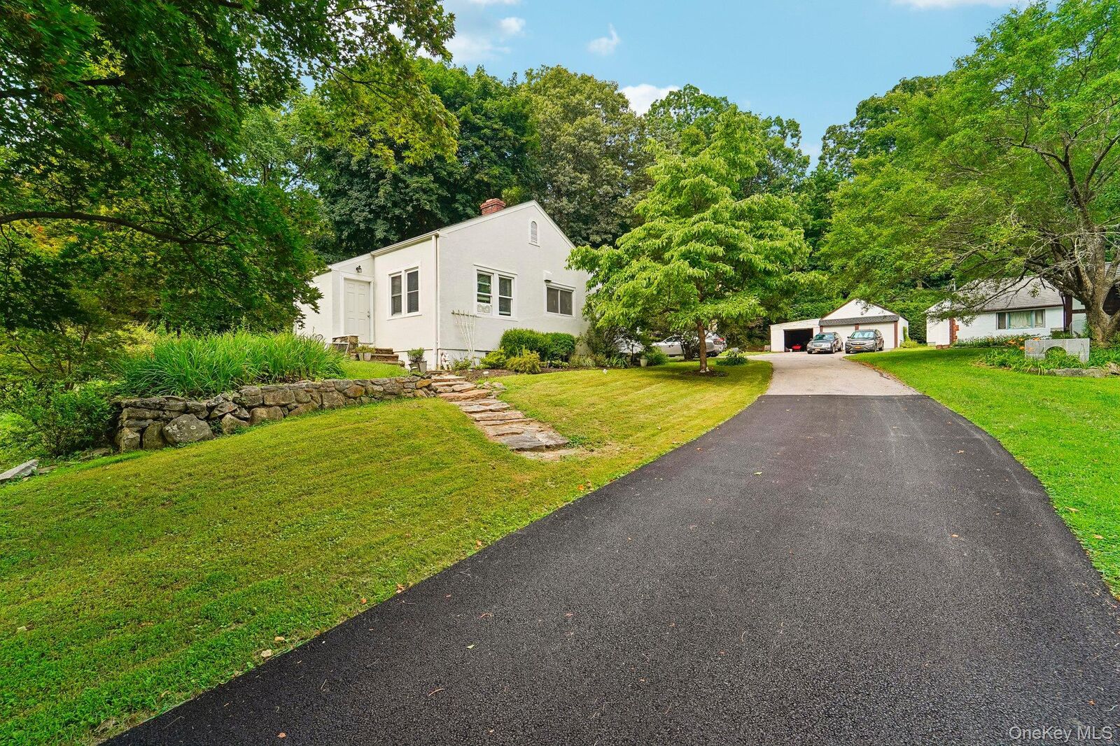 Property Photo: 77 Baron De Hirsch Road NY 10517