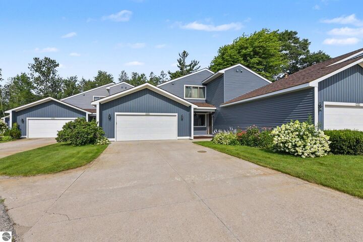 Property Photo: 133 North Shore Drive West 10 MI 49601