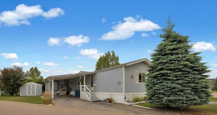 Property Photo: 99 Arbour Lake Drive 62 AB T3G 4E4