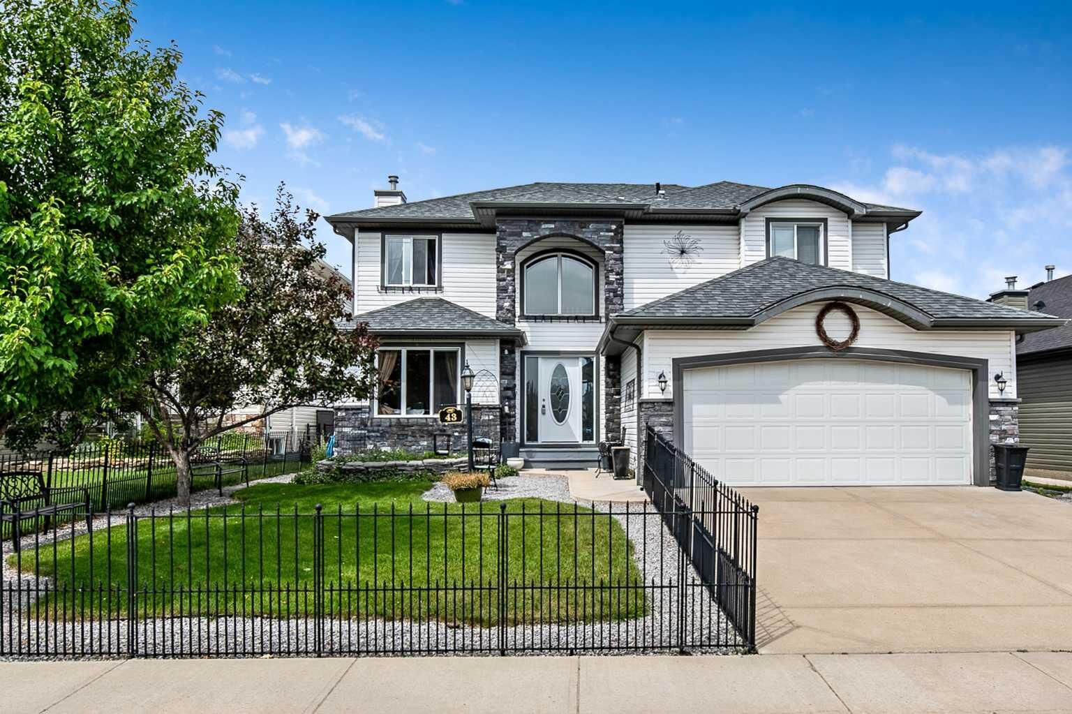 Property Photo: 43 Sheep River Heights AB T1S 2A1