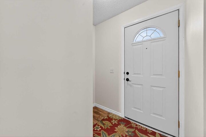 Property Photo:  14736 Deerfield Drive SE 7  AB T2J 5Y1 
