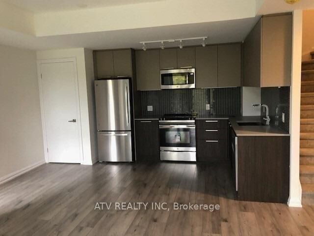 Property Photo: 10 Brin Drive Th17 ON M8X 0B3