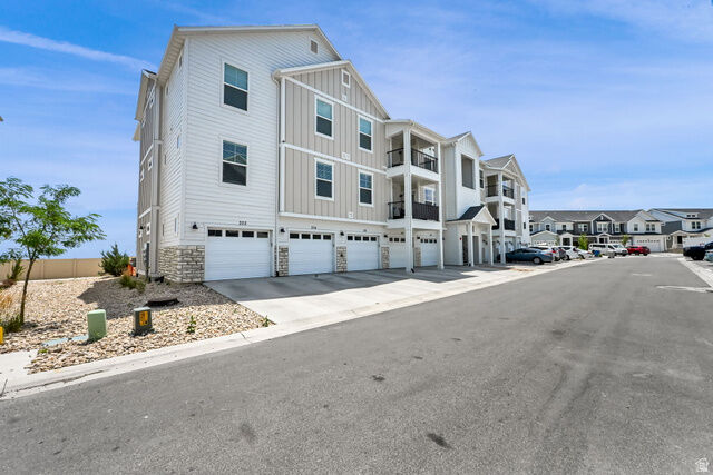 Property Photo:  947 W Coral Charm Way K303  UT 84045 