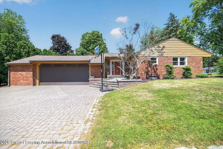 Property Photo:  876 Riverside Drive  MI 48875 
