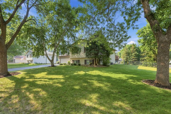 Property Photo:  11852 99th Avenue N  MN 55369 