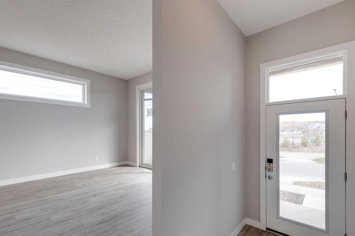 Property Photo:  306 Haskayne Drive NW  AB T3L 0J7 