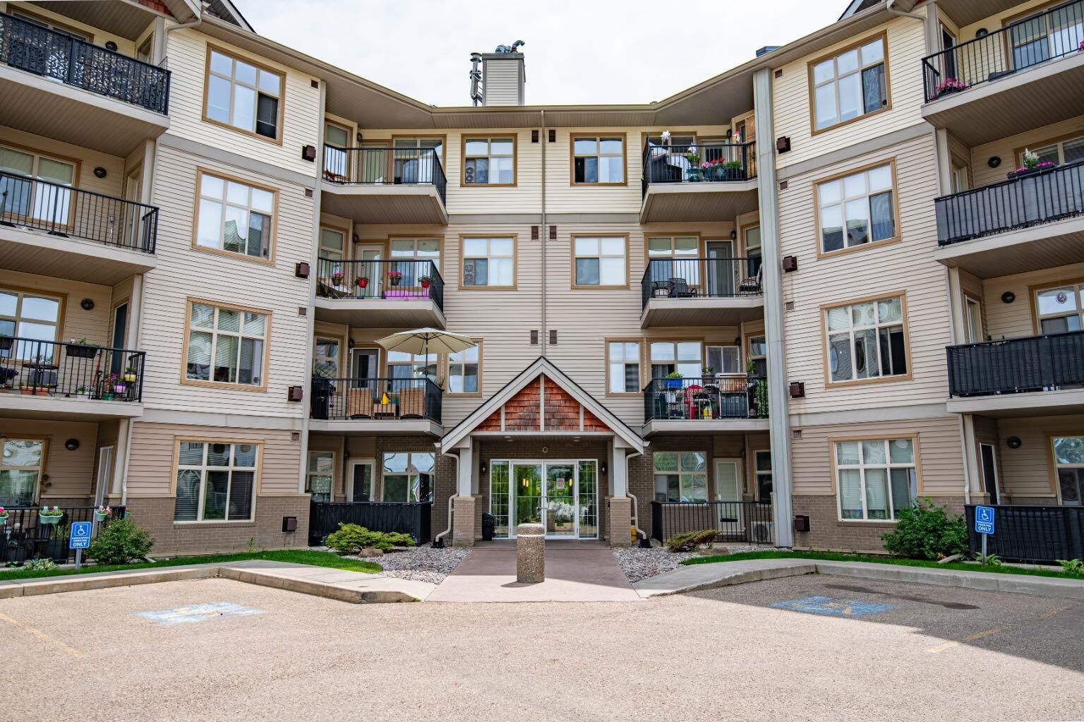 Property Photo: 100 Lakeway Boulevard 324 AB T4S 0A4
