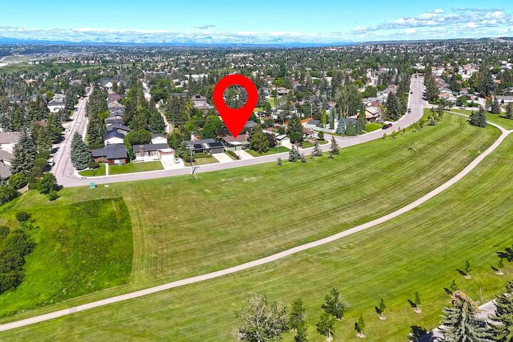 Property Photo:  243 Silvercreek Drive NW  AB T3B 4H1 
