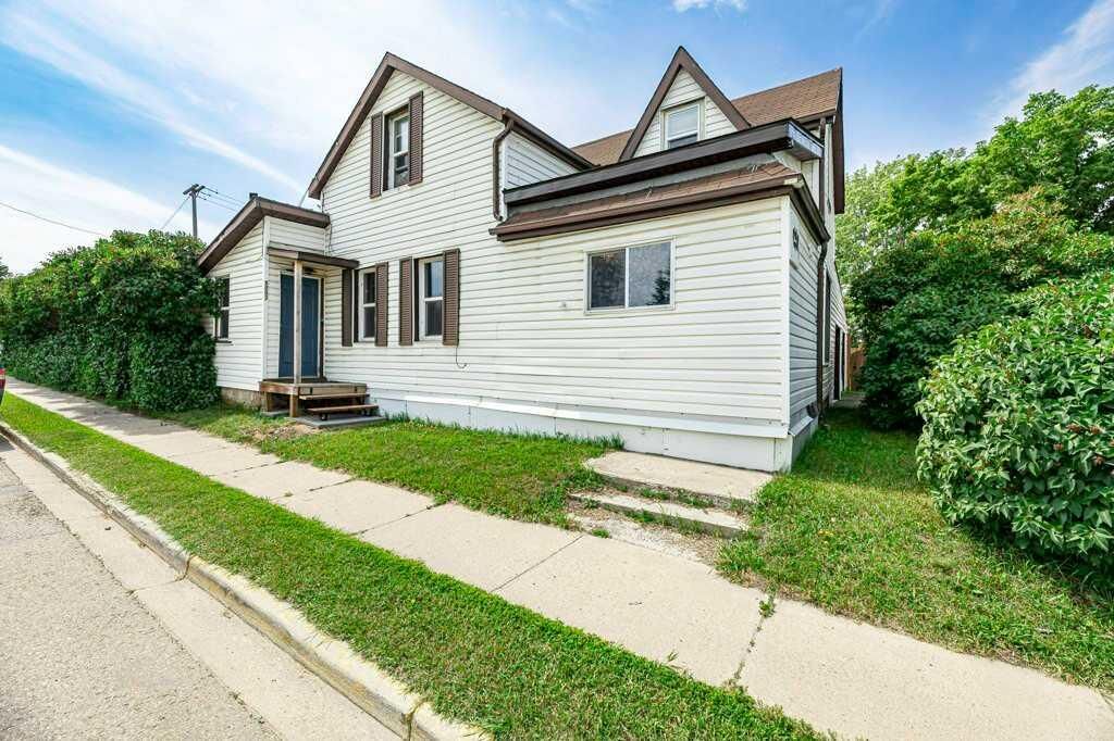 Property Photo: 5003 48 Street AB T4G 1M2