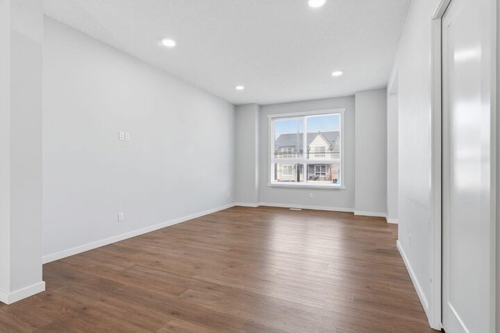 Property Photo:  141 Belmont Drive SW  AB T2X 4Z7 