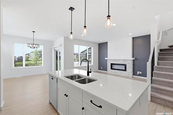 Property Photo:  104 Forsey Avenue  SK S7W 1C8 
