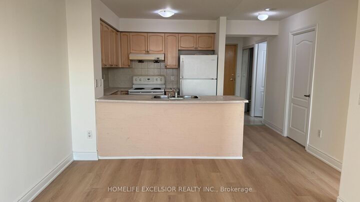 Property Photo: 60 Brian Harrison Way 705 ON M1P 5J5