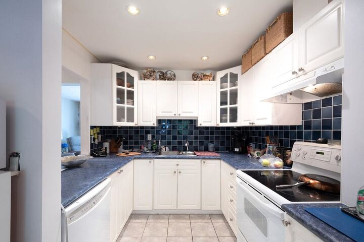 Property Photo: 1950 Cedar Village Crescent 88 BC V7J 3M5