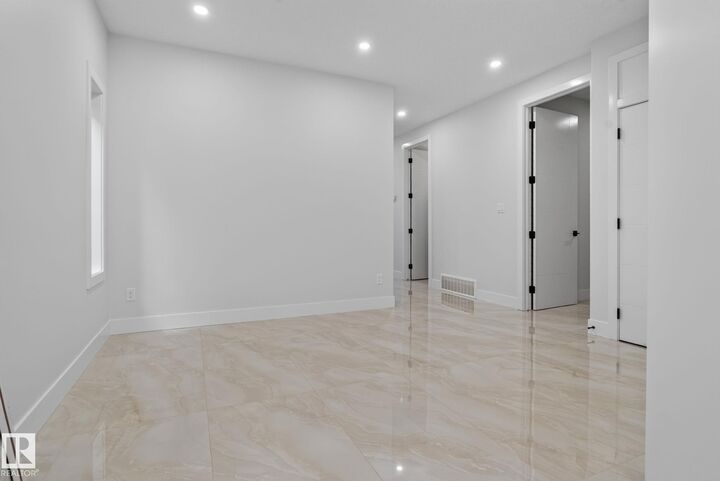Property Photo: 213 Fraser Way NW AB T5Y 4C1