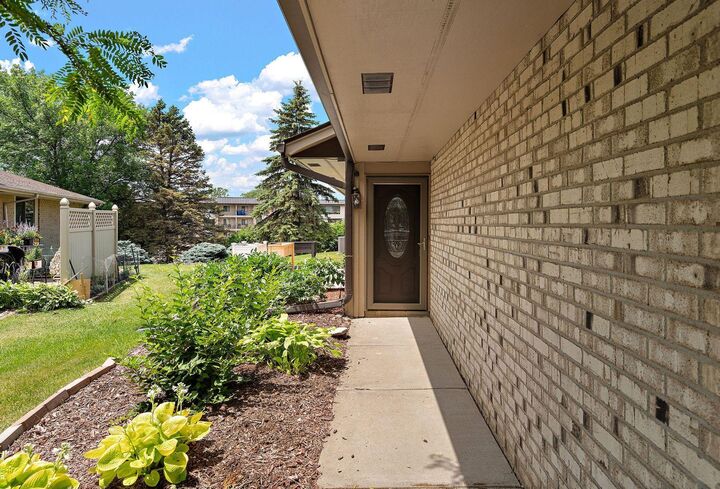 Property Photo:  7051 Robinwood Trail  MN 55125 