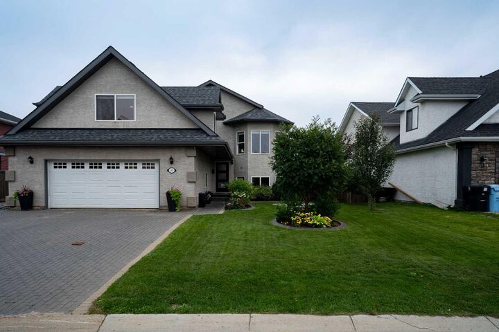 Property Photo: 105 Lindstrom Crescent AB T9K 2N7