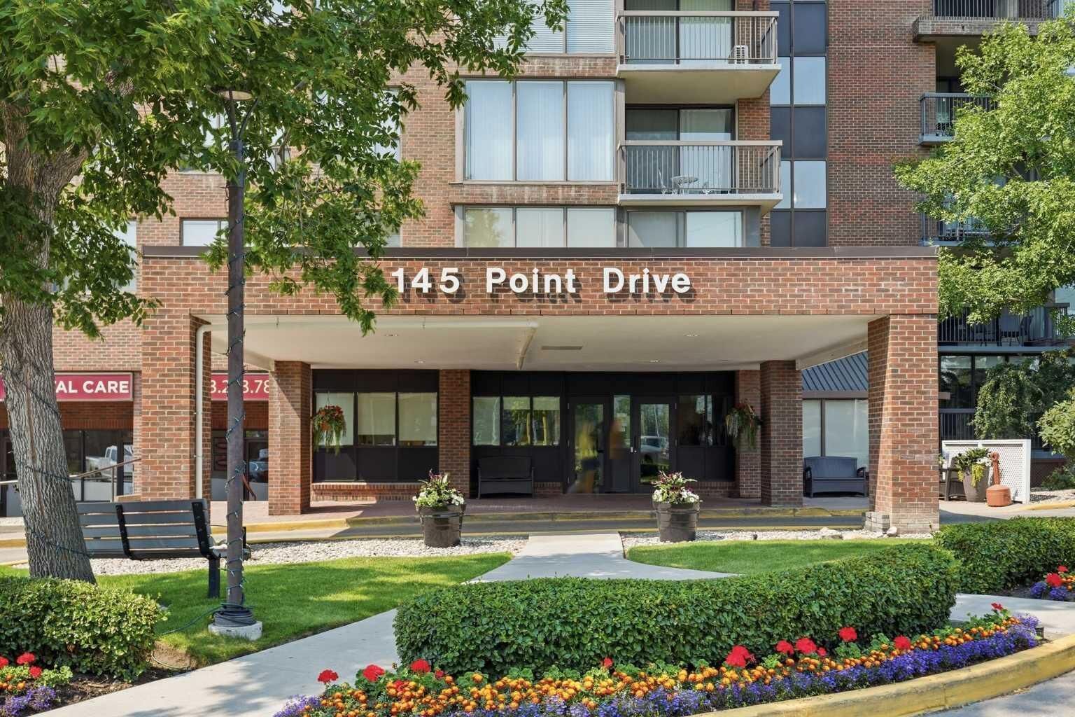 Property Photo: 145 Point Drive NW 406 AB T3B 4W1