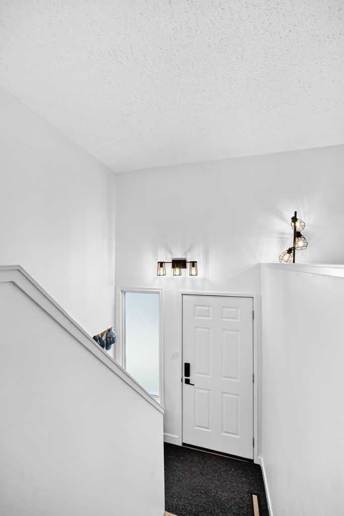 Property Photo: 109 Stanley Avenue D AB T1S 1H8