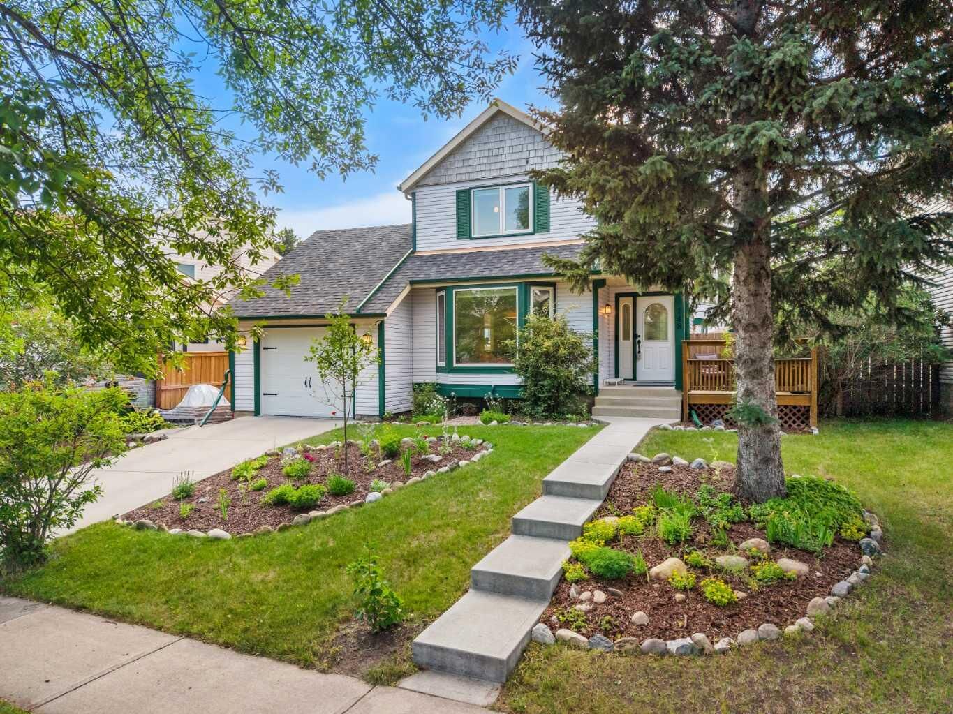Property Photo: 148 Woodridge Drive SW AB T2W 5M2