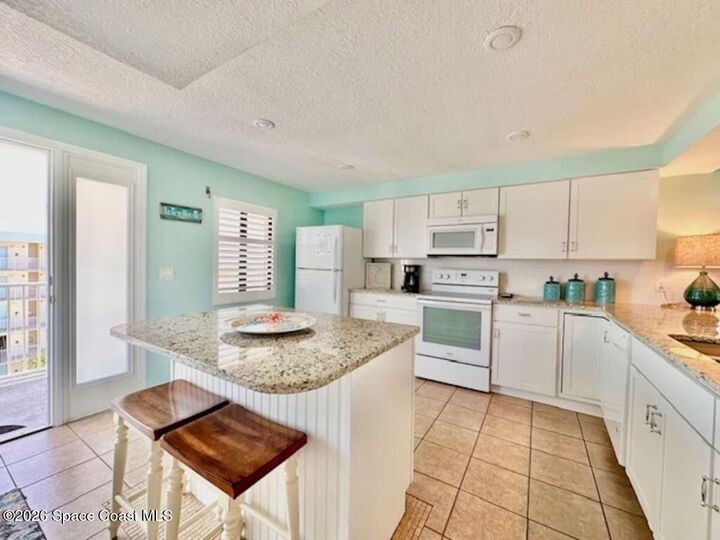 Property Photo:  1050 N Atlantic Avenue  FL 32931 