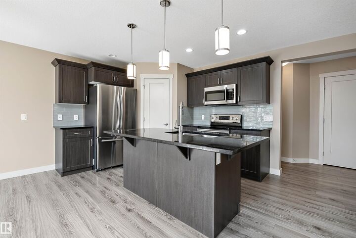 Property Photo:  217 Sunpine Pointe  AB T8H 0Z6 
