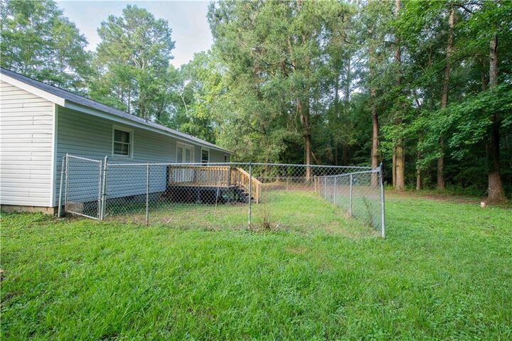 Property Photo:  1085 New Rosedale Road NE  GA 30105 