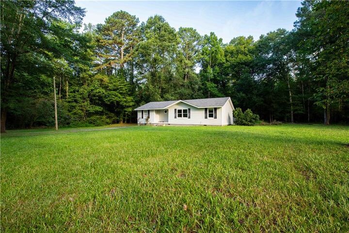 Property Photo:  1085 New Rosedale Road NE  GA 30105 