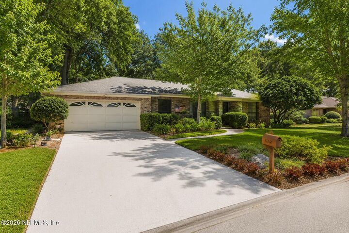 Property Photo:  11341 Woodsong Loop N  FL 32225 