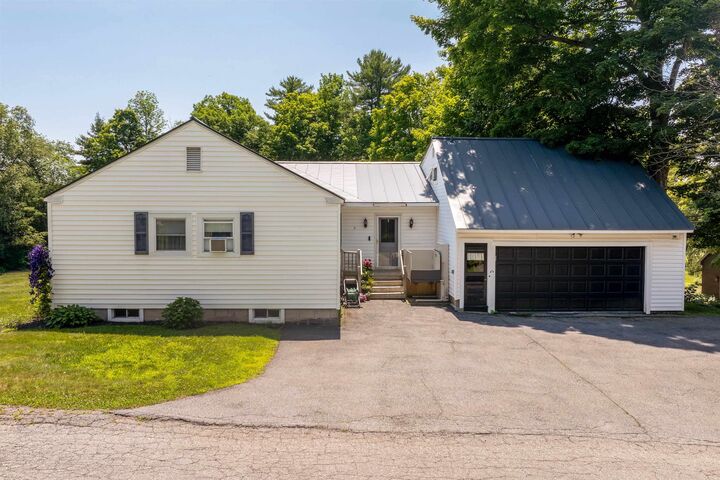 Property Photo:  9 Placid Square  NH 03766 