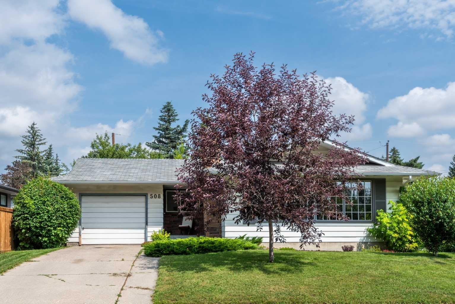 Property Photo: 508 99 Avenue SE AB T2J 0K2