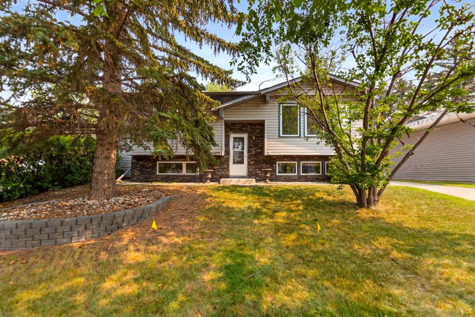 Property Photo:  14695 Deer Ridge Drive SE  AB T2J 6A8 